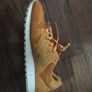 Mustard new balance sneakers